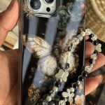 قاب موبایل آیفون پروانه ترنسپرنت مشکی پولکی طلایی